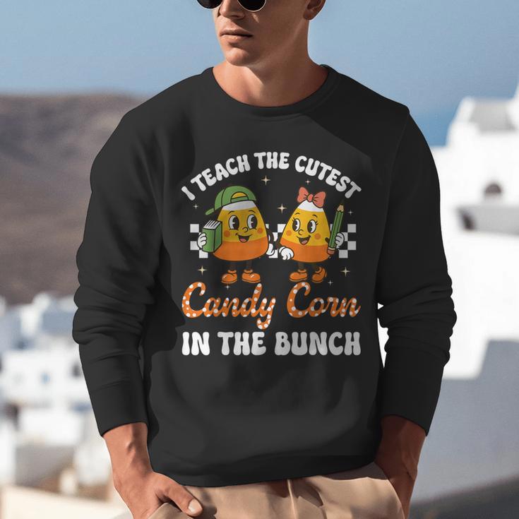 Halloween Teacher Cutest Candy Corn Groovy Spooky Teachers Unisex Sweatshirt, Groovy Teacher Sweatshirts, funny gift