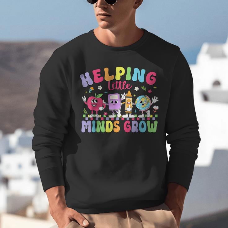Helping Little Minds Grow Teacher Life Back To School Unisex Sweatshirt, funny gift