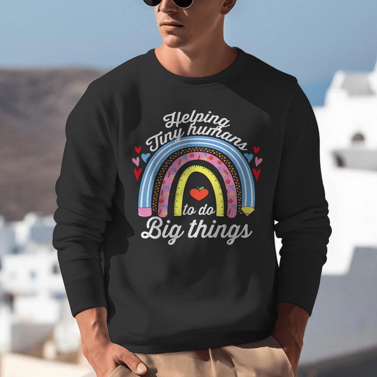 Helping Tiny Humans To Do Big Things Teacher Women Unisex Sweatshirt, funny gift Helping Tiny Humans To Do Big Things Teacher Women Unisex Sweatshirt, funny gift