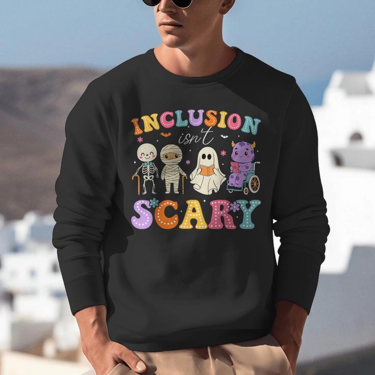 Inclusion Isn't Scary Ghost Halloween SLP Sped Teacher Unisex Sweatshirt, funny gift Inclusion Isn't Scary Ghost Halloween SLP Sped Teacher Unisex Sweatshirt, funny gift