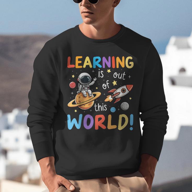 Learning Is Out Of This World Space Back To School Teacher Unisex Sweatshirt, funny gift Learning Is Out Of This World Space Back To School Teacher Unisex Sweatshirt, funny gift