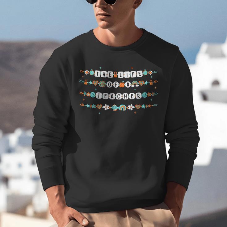 The Life Of a Teacher Teacher Bracelets Elementary School Unisex Sweatshirt, funny gift The Life Of a Teacher Teacher Bracelets Elementary School Unisex Sweatshirt, funny gift