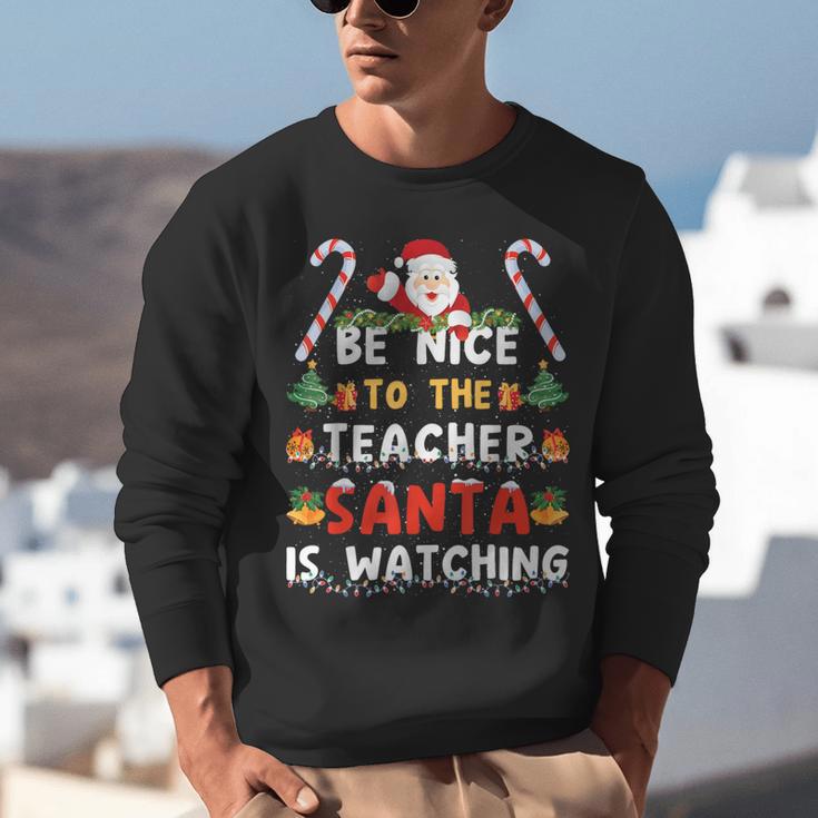 Be Nice To The Teacher Santa Is Watching Christmas Unisex Sweatshirt, funny gift Be Nice To The Teacher Santa Is Watching Christmas Unisex Sweatshirt, funny gift
