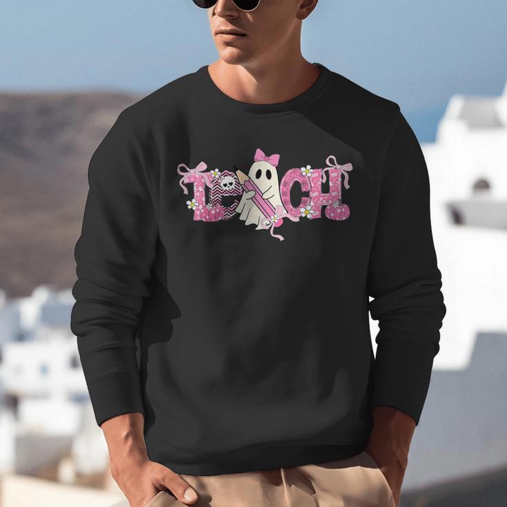 Pink Ghost Teach Halloween Teacher In Spooky Season Unisex Sweatshirt, funny gift Pink Ghost Teach Halloween Teacher In Spooky Season Unisex Sweatshirt, funny gift