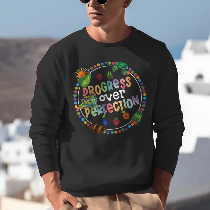Progress Over Perfection Caterpillar Back To School Teacher Unisex Sweatshirt, funny gift Progress Over Perfection Caterpillar Back To School Teacher Unisex Sweatshirt, funny gift