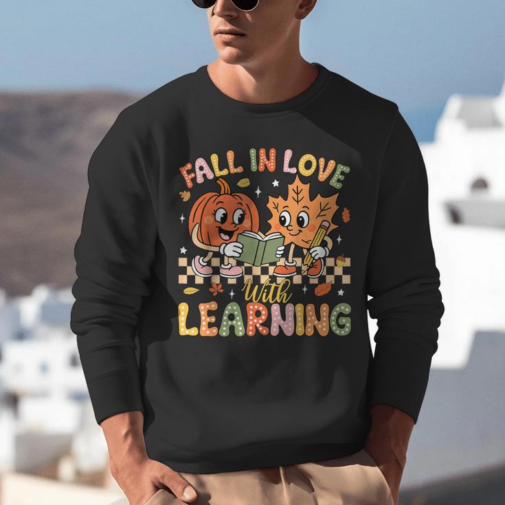 Retro Fall In Love With Learning Autumn Pumpkin Teacher Kids Unisex Sweatshirt, funny gift Retro Fall In Love With Learning Autumn Pumpkin Teacher Kids Unisex Sweatshirt, funny gift