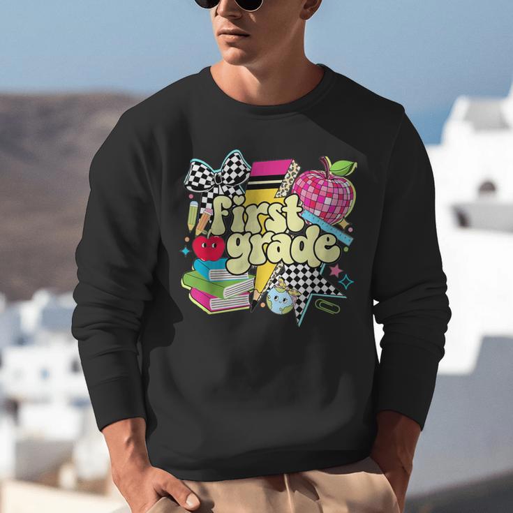 Retro First Grade Teacher Disco Ball Coquette Back To School Unisex Sweatshirt, First Grade Teacher Sweatshirts, funny gift Retro First Grade Teacher Disco Ball Coquette Back To School Unisex Sweatshirt, First Grade Teacher Sweatshirts, funny gift