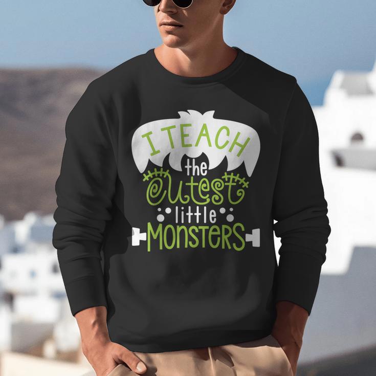 I Teach The Cutest Little Monsters Halloween Teacher Spooky Unisex Sweatshirt, funny gift I Teach The Cutest Little Monsters Halloween Teacher Spooky Unisex Sweatshirt, funny gift