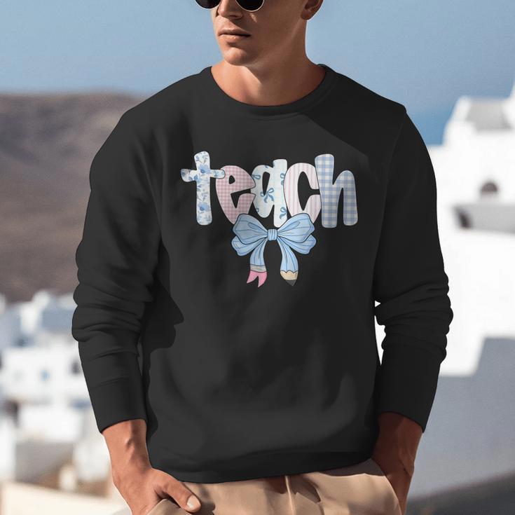 Teach Teacher Coquette Bow Pencil Back To School First Day Unisex Sweatshirt, funny gift Teach Teacher Coquette Bow Pencil Back To School First Day Unisex Sweatshirt, funny gift