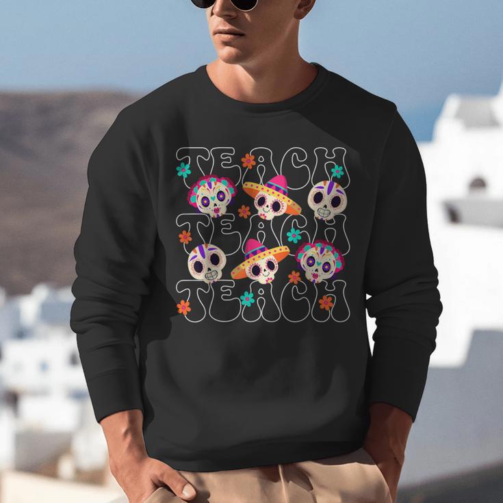 Teach Teacher Dia De Los Muertos Day Of The Dead Sugar Skull Unisex Sweatshirt, funny gift Teach Teacher Dia De Los Muertos Day Of The Dead Sugar Skull Unisex Sweatshirt, funny gift