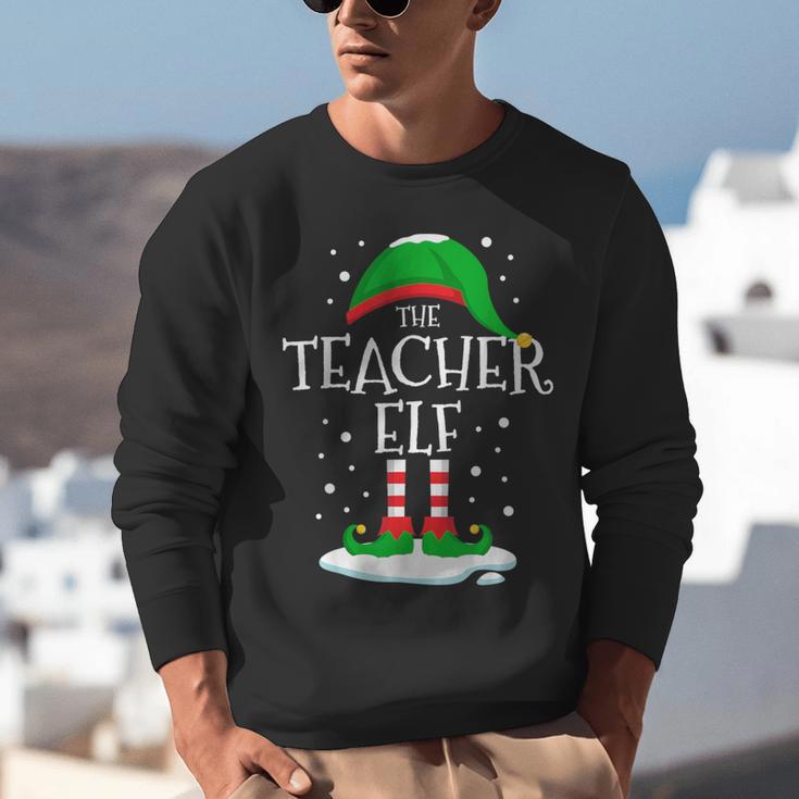 The Teacher Elf Christmas Family Matching Xmas Group For Men Women Unisex Sweatshirt, funny gift The Teacher Elf Christmas Family Matching Xmas Group For Men Women Unisex Sweatshirt, funny gift