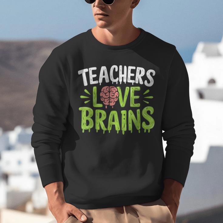 Teachers Love Brains Halloween Teacher Zombie Unisex Sweatshirt, funny gift Teachers Love Brains Halloween Teacher Zombie Unisex Sweatshirt, funny gift