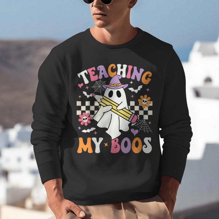 Teaching My Boos Ghost Teacher Cute Groovy Halloween Teacher Unisex Sweatshirt, Groovy Teacher Sweatshirts, funny gift