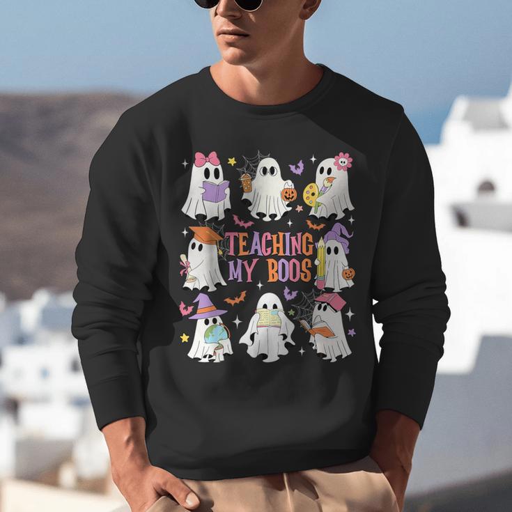 Teaching My Boos Teacher Cute Ghost Groovy Teacher Halloween Unisex Sweatshirt, Groovy Teacher Sweatshirts, funny gift Teaching My Boos Teacher Cute Ghost Groovy Teacher Halloween Unisex Sweatshirt, Groovy Teacher Sweatshirts, funny gift