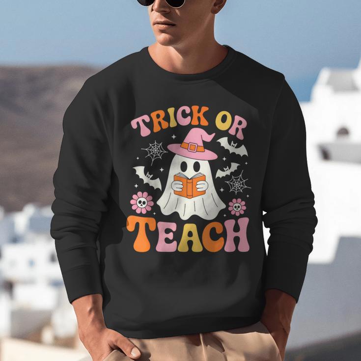 Trick Or Teach Cute Floral Ghost Teacher Halloween Costume Unisex Sweatshirt, funny gift