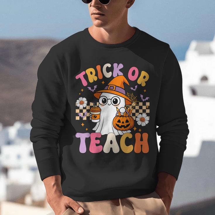 Trick Or Teach Cute Ghost Coffee Pumpkins Halloween Teacher Unisex Sweatshirt, funny gift Trick Or Teach Cute Ghost Coffee Pumpkins Halloween Teacher Unisex Sweatshirt, funny gift