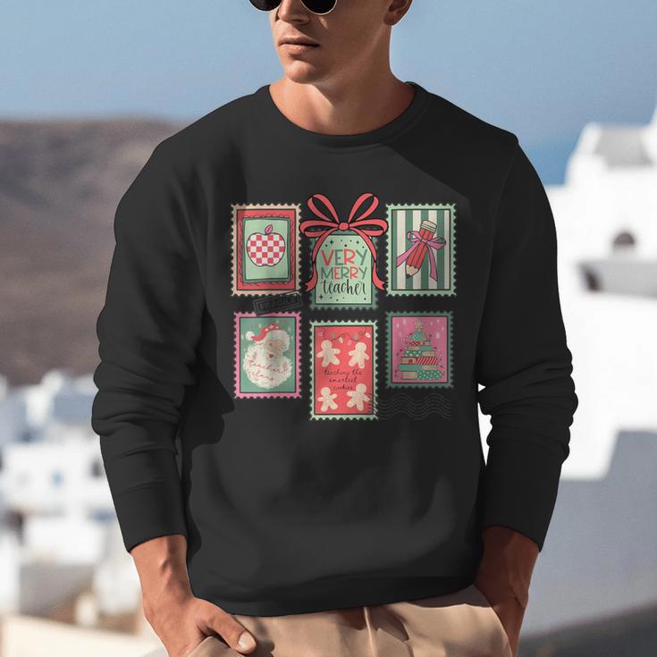 Vintage Preppy Very Merry Teacher Santa Stamps Christmas Unisex Sweatshirt, funny gift Vintage Preppy Very Merry Teacher Santa Stamps Christmas Unisex Sweatshirt, funny gift