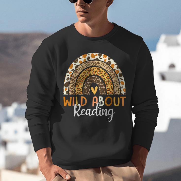Wild About Reading Teacher Back To School Leopard Rainbow Unisex Sweatshirt, funny gift