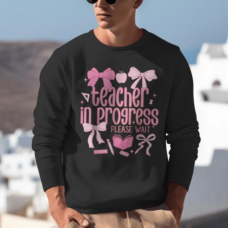 Women Teacher In Progress Coquette Pink Bow Future Teacher Unisex Sweatshirt, Future Teacher Sweatshirts, funny gift