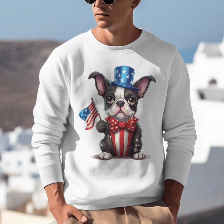 Boston Terrier Puppy Dog Holds His American Flag 4th Of July Unisex Sweatshirt, American Boston Terrier Sweatshirts, Boston Terrier 4th Of July Sweatshirts, funny gift