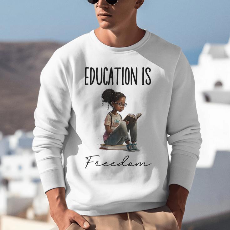 Education Is Freedom Teacher Books Black History Month Unisex Sweatshirt, History Teacher Sweatshirts, funny gift Education Is Freedom Teacher Books Black History Month Unisex Sweatshirt, History Teacher Sweatshirts, funny gift