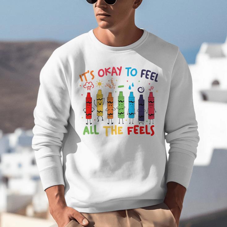 Its Okay To Feel All The Feels Mood Color Crayons Teacher Unisex Sweatshirt, funny gift Its Okay To Feel All The Feels Mood Color Crayons Teacher Unisex Sweatshirt, funny gift