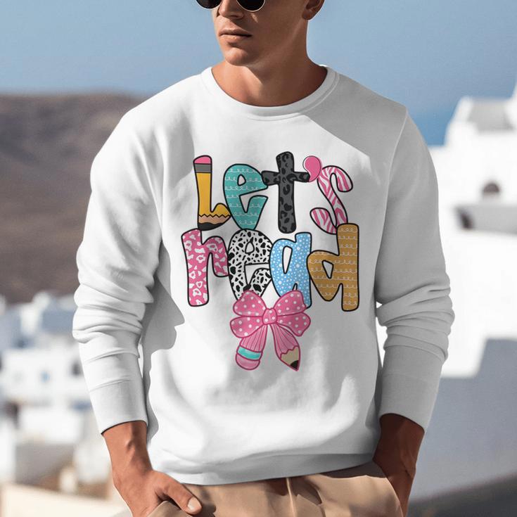 Lets Read Reading Teacher Back To School Literacy Pencil Bow Unisex Sweatshirt, funny gift Lets Read Reading Teacher Back To School Literacy Pencil Bow Unisex Sweatshirt, funny gift