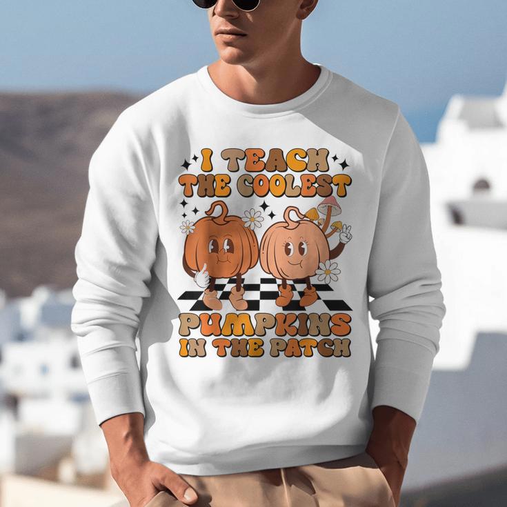 I Teach The Coolest Pumpkins In The Patch Teacher Halloween Unisex Sweatshirt, funny gift I Teach The Coolest Pumpkins In The Patch Teacher Halloween Unisex Sweatshirt, funny gift