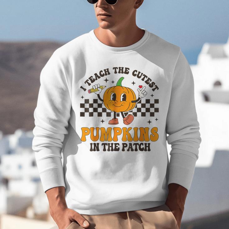 I Teach The Cutest Pumpkins In The Patch Groovy Teacher Fall Unisex Sweatshirt, Groovy Teacher Sweatshirts, funny gift