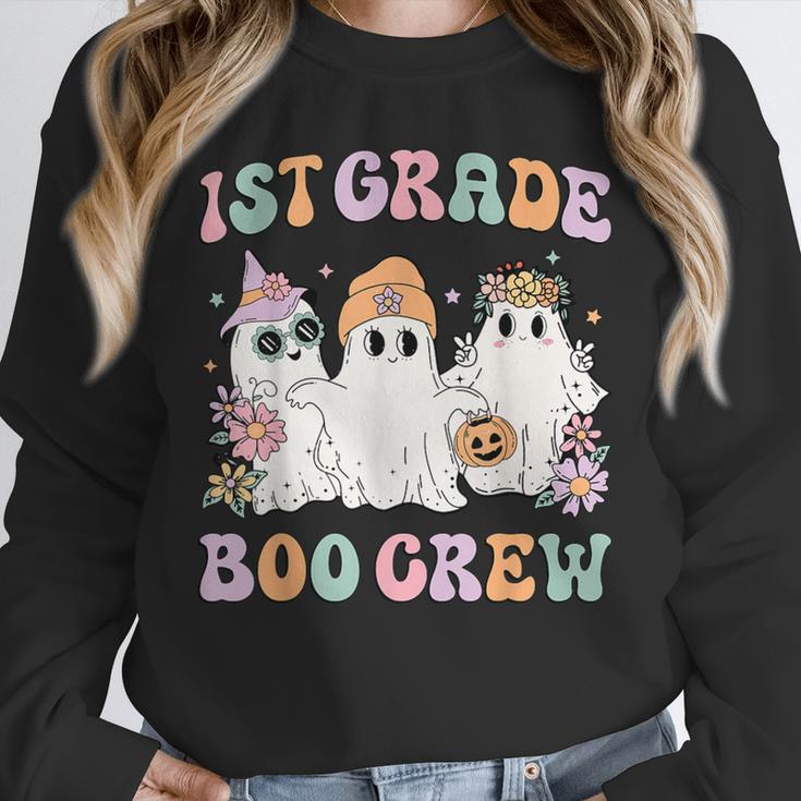 1st Grade Boo Crew Groovy Halloween Floral Ghost Kid Teacher Unisex Sweatshirt, novelty gifts, funny gifts 1st Grade Boo Crew Groovy Halloween Floral Ghost Kid Teacher Unisex Sweatshirt, novelty gifts, funny gifts