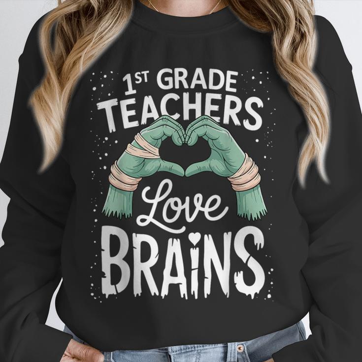 1st Grade Teachers Love Brains Shirt Halloween Teacher Unisex Sweatshirt, novelty gifts, funny gifts