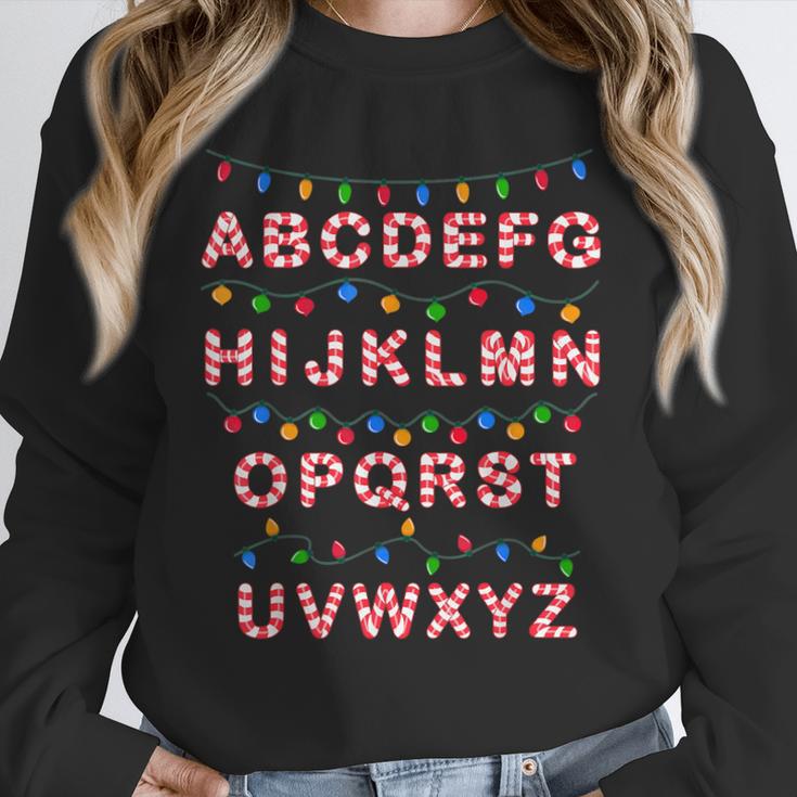 Christmas Alphabet Candy Cane Teachers Students Candy Cane For Men Women Kids Unisex Sweatshirt, novelty gifts, funny gifts Christmas Alphabet Candy Cane Teachers Students Candy Cane For Men Women Kids Unisex Sweatshirt, novelty gifts, funny gifts