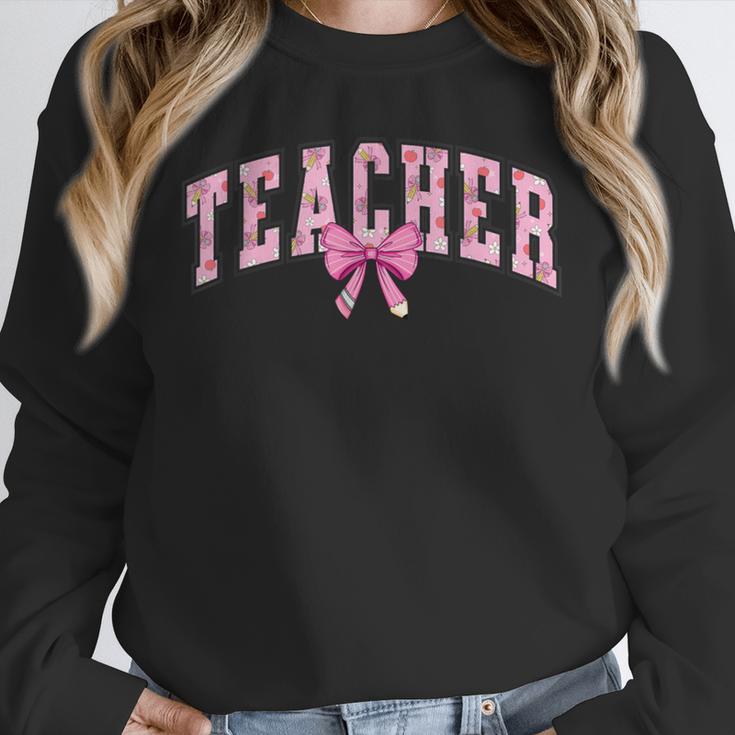 Coquette Bow Back To School First Day Teacher Unisex Sweatshirt, novelty gifts, funny gifts Coquette Bow Back To School First Day Teacher Unisex Sweatshirt, novelty gifts, funny gifts