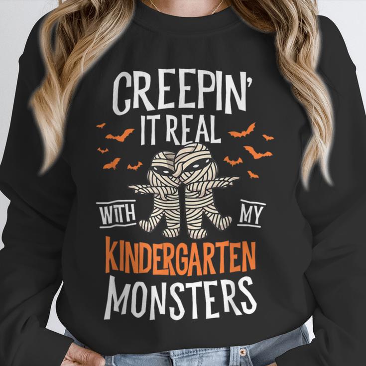Creepin It Real Kindergarten Monsters Halloween Teacher Unisex Sweatshirt, novelty gifts, funny gifts
