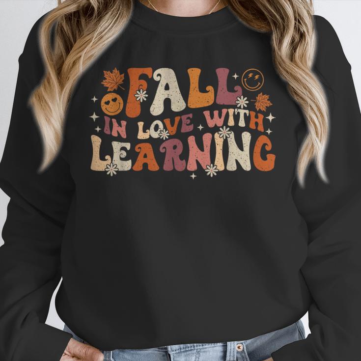 Fall In Love With Learning Autum Thanksgiving Teacher Kids Unisex Sweatshirt, novelty gifts, funny gifts Fall In Love With Learning Autum Thanksgiving Teacher Kids Unisex Sweatshirt, novelty gifts, funny gifts