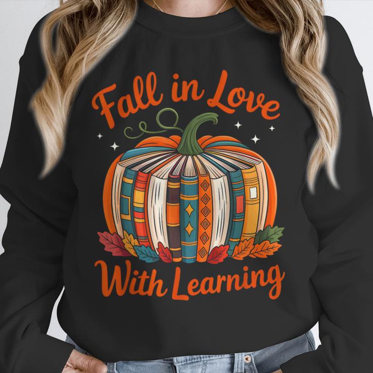 Fall In Love With Learning Book Lover Autumn Pumpkin Teacher Unisex Sweatshirt, novelty gifts, funny gifts