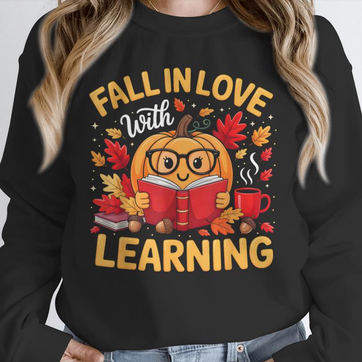 Fall In Love With Learning Pumpkin Thanksgiving Teacher Fall Unisex Sweatshirt, novelty gifts, funny gifts