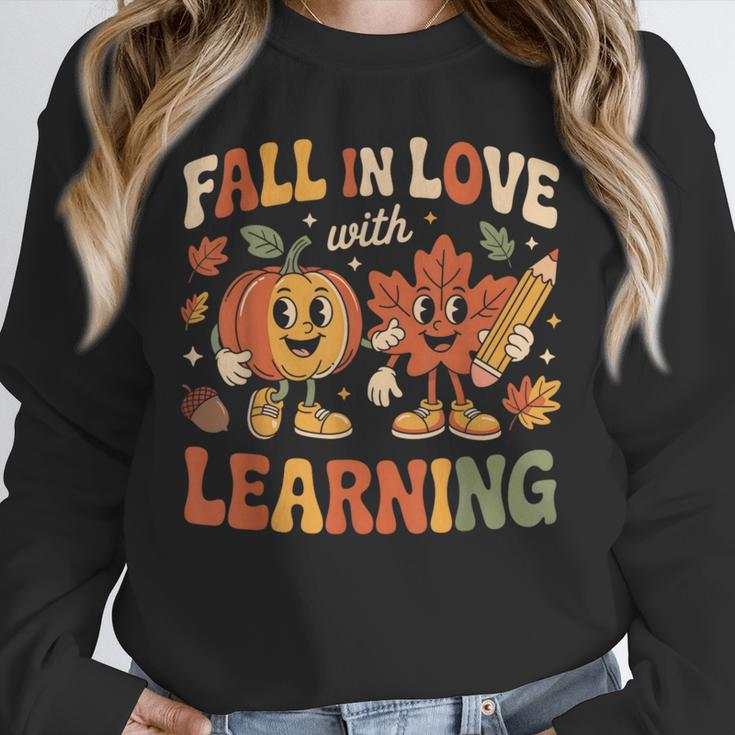 Fall In Love With Learning Retro Autumn Thanksgiving Teacher Unisex Sweatshirt, novelty gifts, funny gifts Fall In Love With Learning Retro Autumn Thanksgiving Teacher Unisex Sweatshirt, novelty gifts, funny gifts