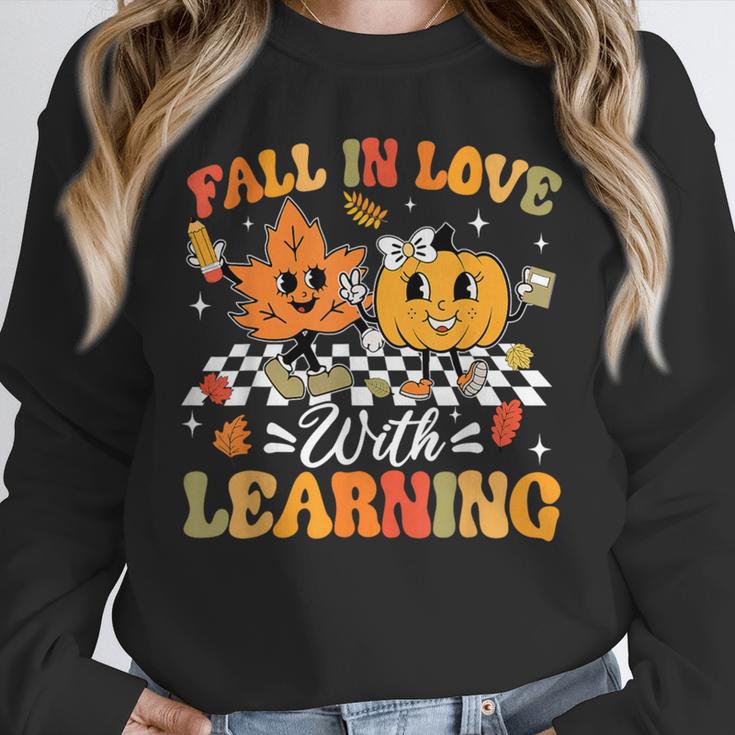 Fall In Love With Learning Fall Teacher Thanksgiving Retro Unisex Sweatshirt, novelty gifts, funny gifts Fall In Love With Learning Fall Teacher Thanksgiving Retro Unisex Sweatshirt, novelty gifts, funny gifts