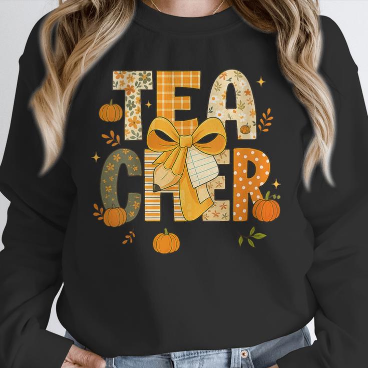 Fall Teacher Pumpkin Coquette Bow Autumn Classroom Unisex Sweatshirt, novelty gifts, funny gifts
