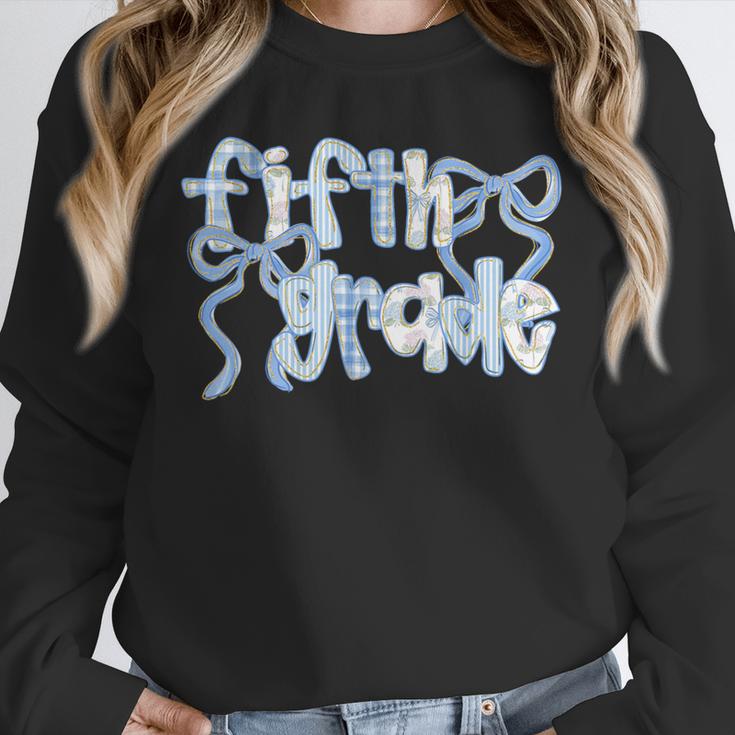 Fifth Grade Team Coquette Bow 5th Grade Teacher Girl Kid Unisex Sweatshirt, novelty gifts, funny gifts