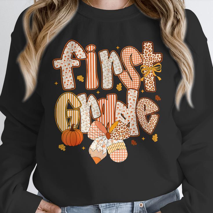 First Grade Fall Floral Coquette Bow Teachers Students Unisex Sweatshirt, novelty gifts, funny gifts First Grade Fall Floral Coquette Bow Teachers Students Unisex Sweatshirt, novelty gifts, funny gifts