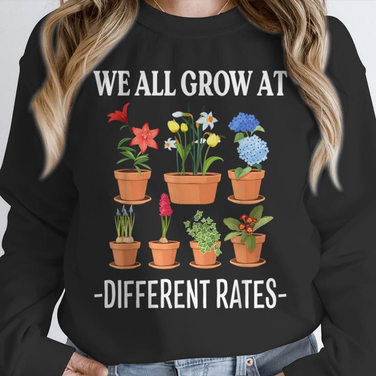 We All Grow At Different Rates Back To School Teacher Unisex Sweatshirt, novelty gifts, funny gifts We All Grow At Different Rates Back To School Teacher Unisex Sweatshirt, novelty gifts, funny gifts