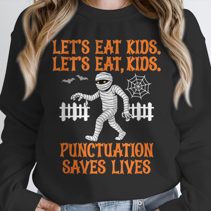 Halloween Lets Eat Kids Punctuation Teacher Unisex Sweatshirt, novelty gifts, funny gifts Halloween Lets Eat Kids Punctuation Teacher Unisex Sweatshirt, novelty gifts, funny gifts
