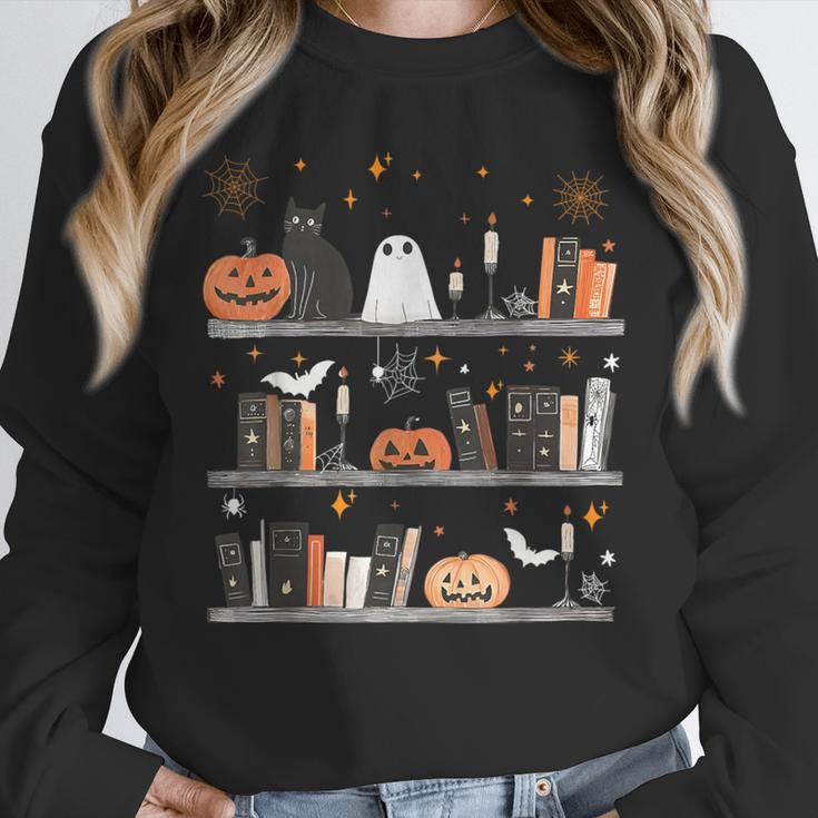 Halloween Library Ghost Books Teacher Spooky Trick Or Teach Unisex Sweatshirt, novelty gifts, funny gifts Halloween Library Ghost Books Teacher Spooky Trick Or Teach Unisex Sweatshirt, novelty gifts, funny gifts