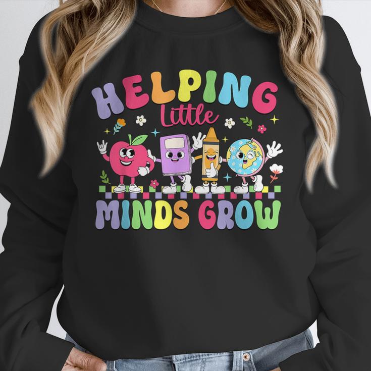 Helping Little Minds Grow Teacher Life Back To School Unisex Sweatshirt, novelty gifts, funny gifts