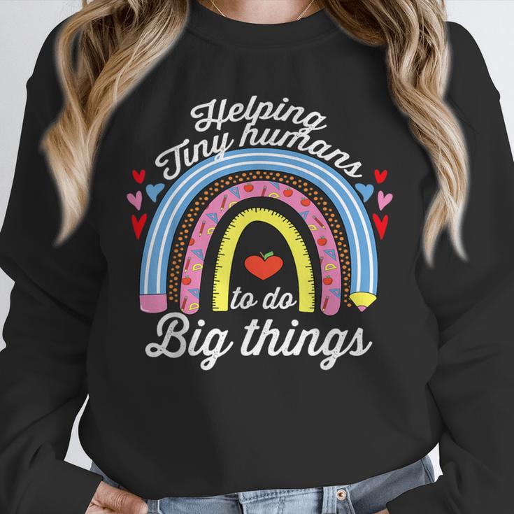 Helping Tiny Humans To Do Big Things Teacher Women Unisex Sweatshirt, novelty gifts, funny gifts Helping Tiny Humans To Do Big Things Teacher Women Unisex Sweatshirt, novelty gifts, funny gifts