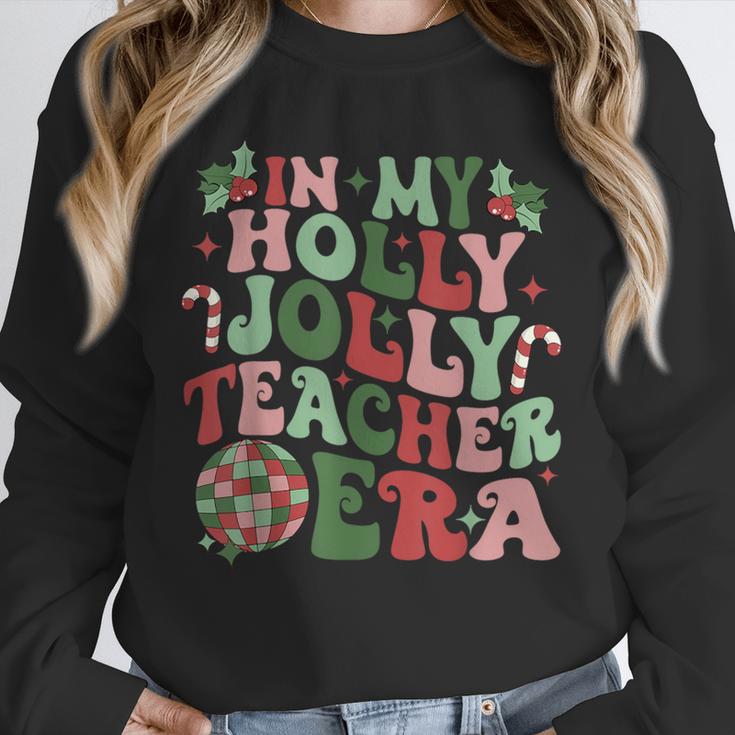In My Holly Xmas Jolly Teacher Era Teacher Vibes Christmas For Men Women Kids Unisex Sweatshirt, novelty gifts, funny gifts In My Holly Xmas Jolly Teacher Era Teacher Vibes Christmas For Men Women Kids Unisex Sweatshirt, novelty gifts, funny gifts