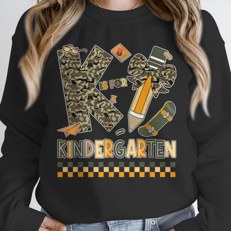 K Is For Kindergarten Teacher Coquette Bow Camo Unisex Sweatshirt, novelty gifts, funny gifts K Is For Kindergarten Teacher Coquette Bow Camo Unisex Sweatshirt, novelty gifts, funny gifts