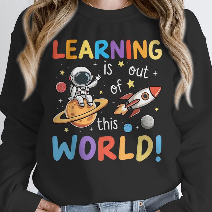 Learning Is Out Of This World Space Back To School Teacher Unisex Sweatshirt, novelty gifts, funny gifts Learning Is Out Of This World Space Back To School Teacher Unisex Sweatshirt, novelty gifts, funny gifts